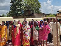 Foodgrain distribution at Anandwadi families